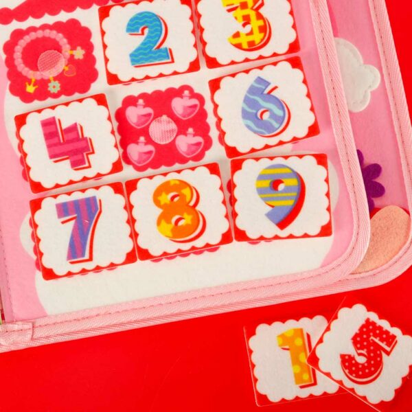 Tablica manipulacyjna sensoryczna montessori walizka plecak rozowa